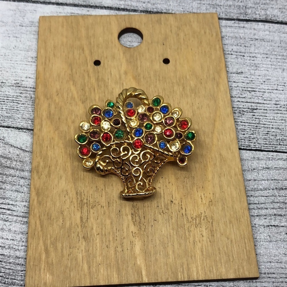 Vintage filigree bejeweled flower bouquet statement brooch.